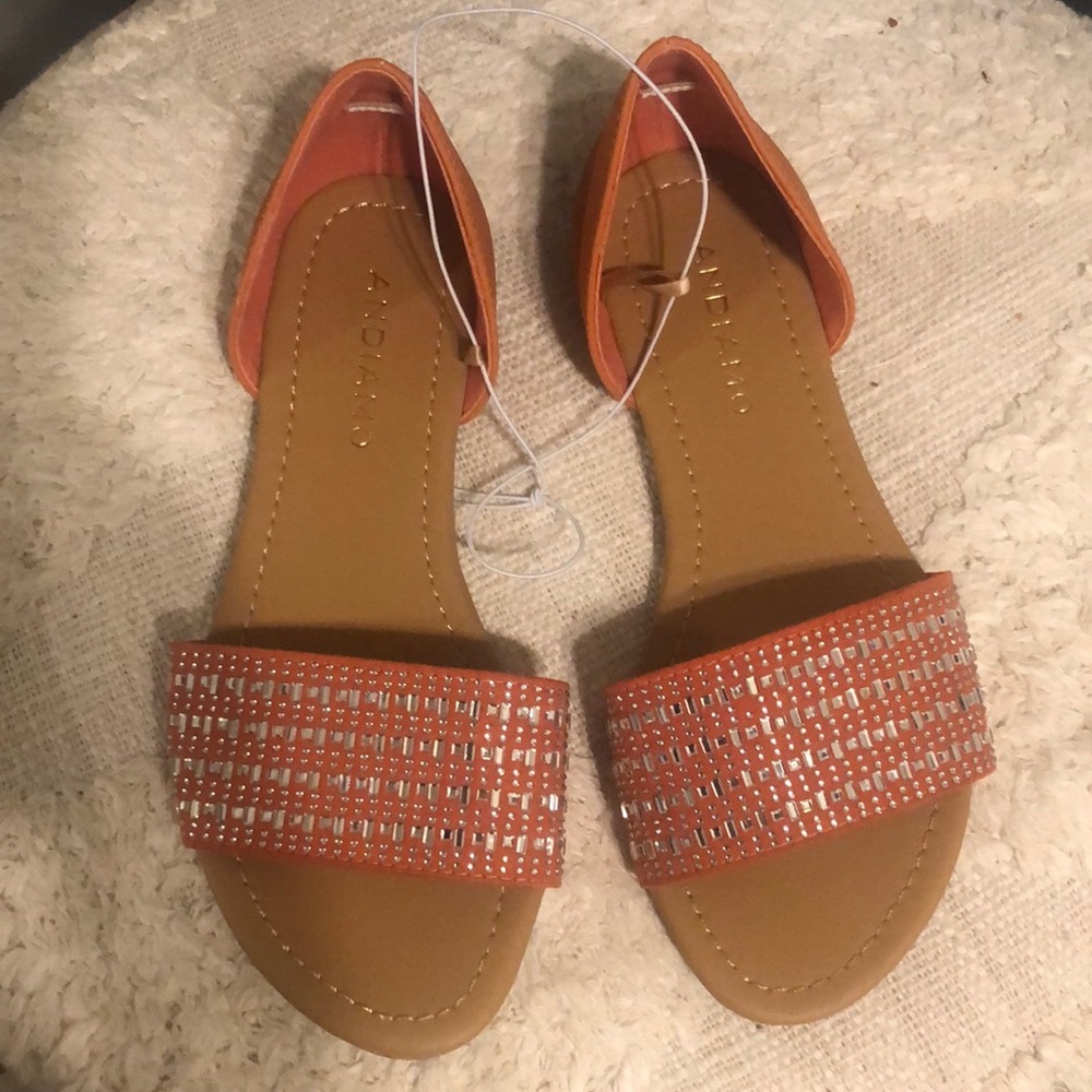 Andiamo burnt orange flat sandals.